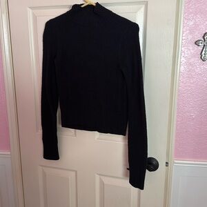 Black turtle neck sweater